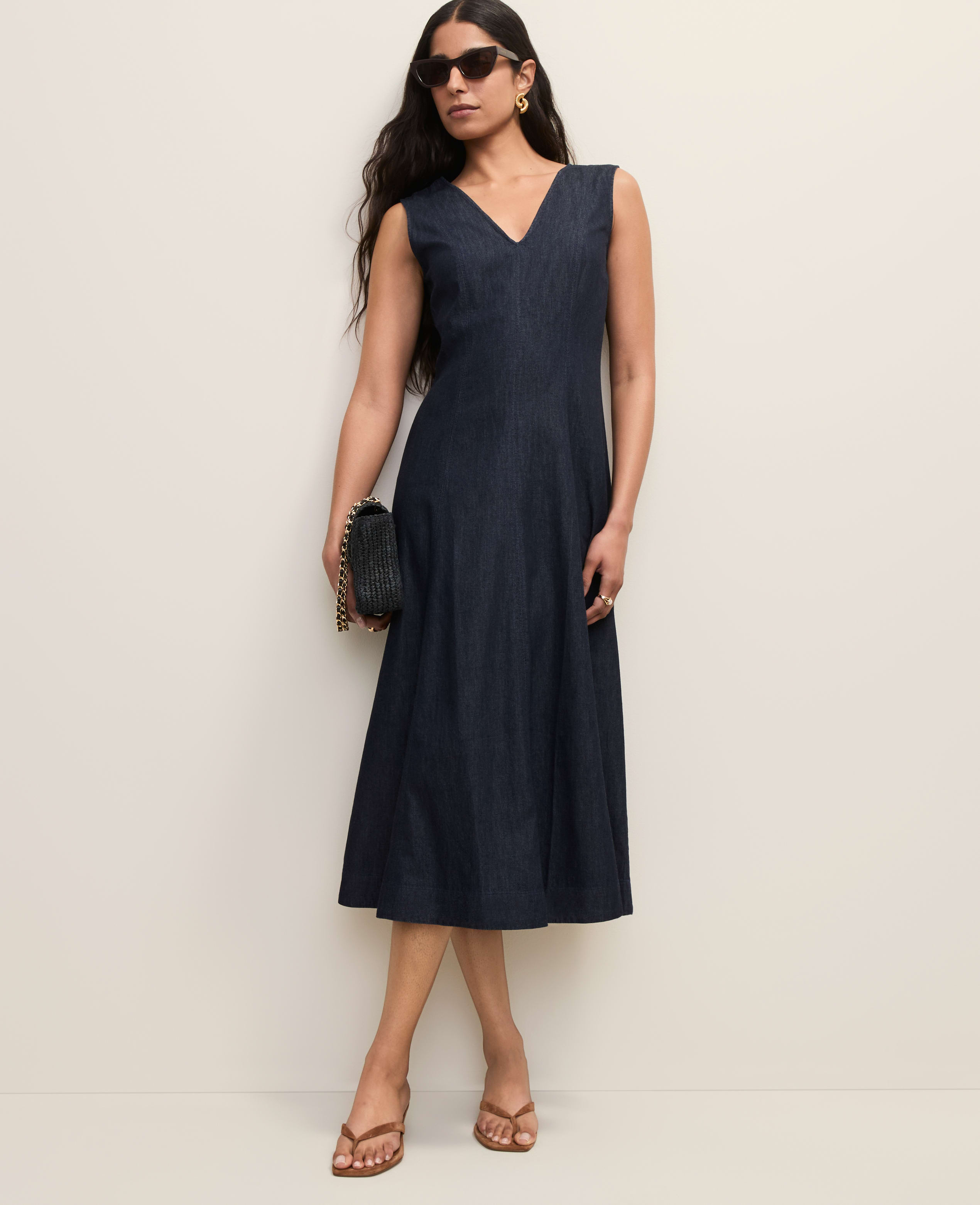 chambray fitted midi dress The Blue Jean Baby Midi Dress is the kind of piece you'll reach for all  year long.  That chambray fabric has just the right amount of structure  with a flattering fitted