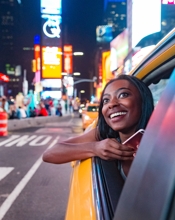 Women in taxi while in Time Square New York