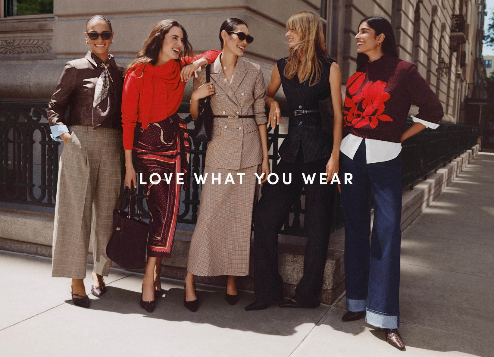 Love what you wear — five women in fall tailoring on a city sidewalk