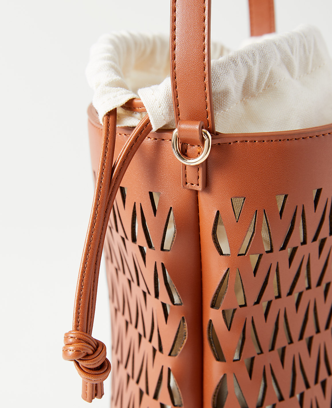 Weekend Collection Perforated Crossbody Bucket Bag
