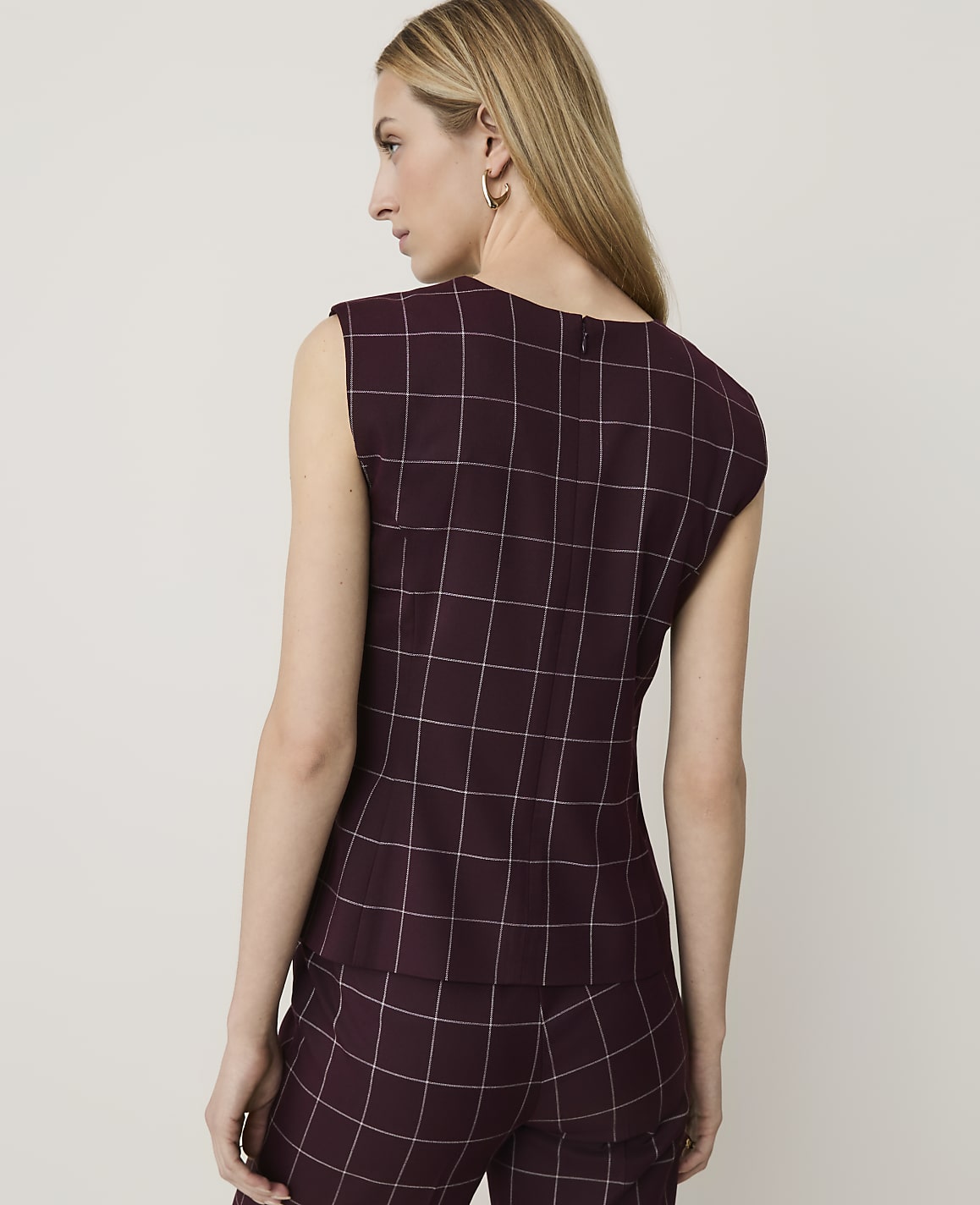 The Petite Windowpane Crew Neck Peplum Top