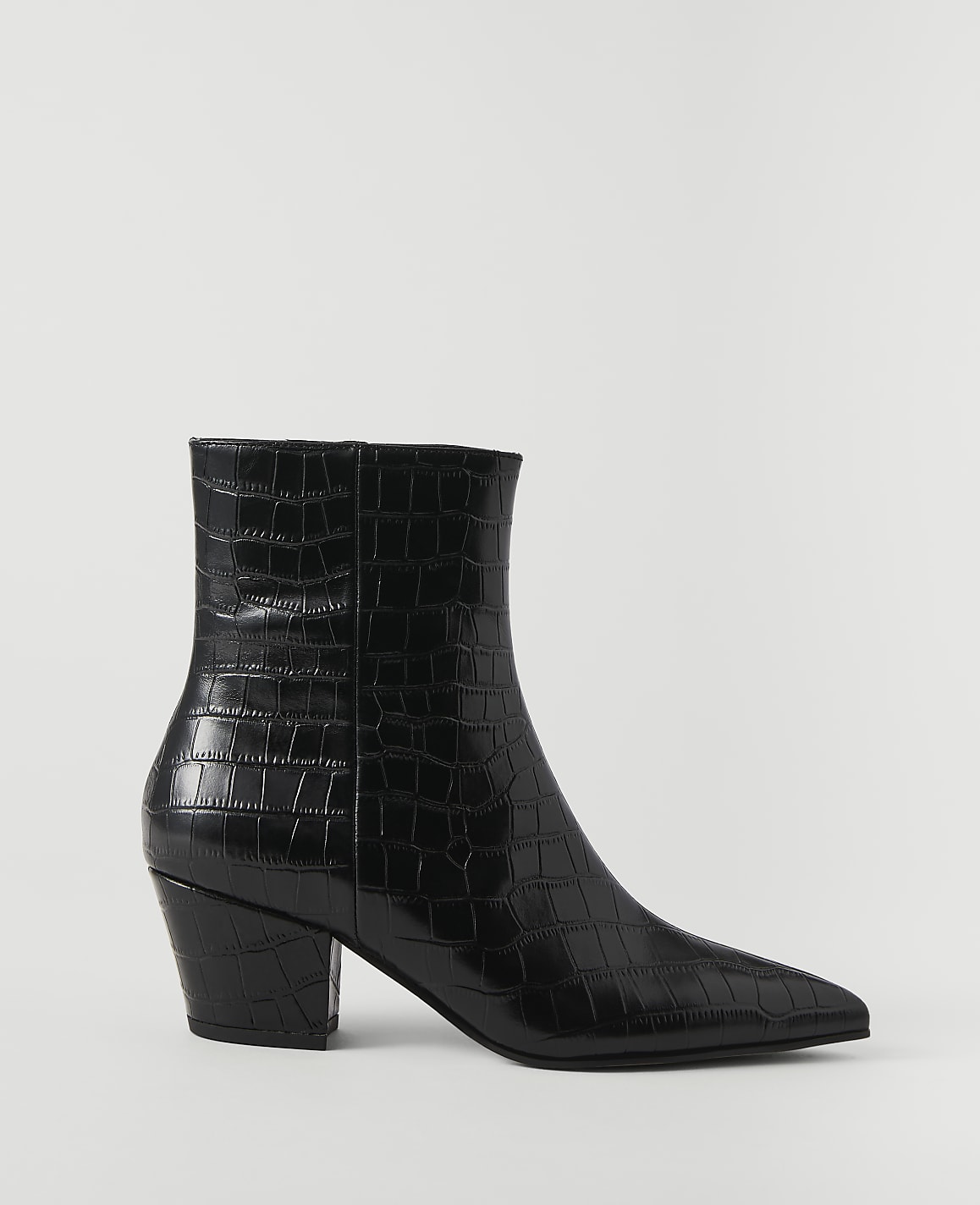 A black, crocodile-embossed ankle boot with a pointed toe and block heel stands against a plain white background.