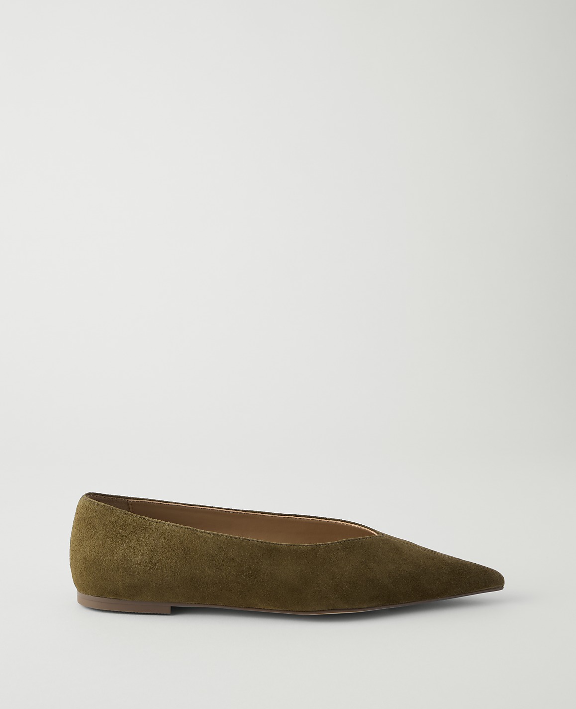 A single olive green pointed-toe flat shoe rests on a plain white background.
