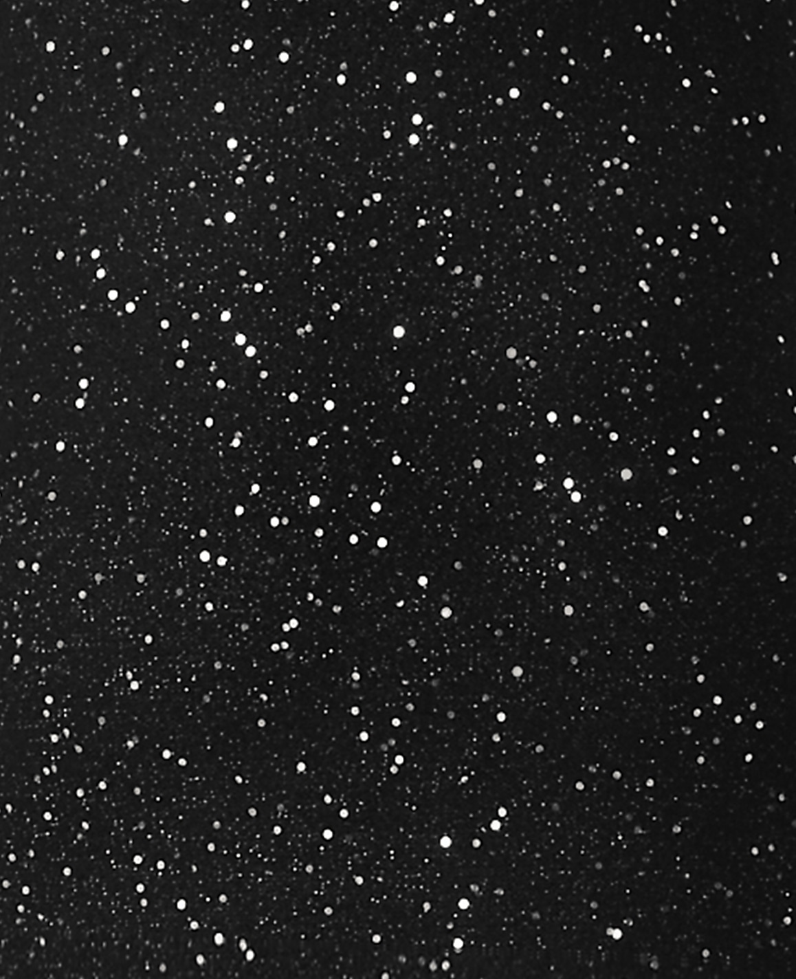 Numerous bright white dots of varying sizes are scattered across a solid black background.