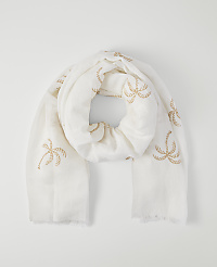 A white scarf with embroidered palm trees is laid out against a plain white background. carousel Product Image 1