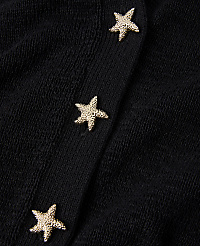 Three golden starfish buttons are sewn onto a textured black fabric. carousel Product Image 2