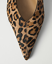 A close-up of a pointed-toe leopard print shoe with a white background. carousel Product Image 2