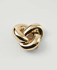 A shiny gold knot rests on a plain white background. carousel Product Image 1
