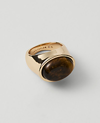 A gold ring with a tiger's eye stone sits on a plain white background. carousel Product Image 1