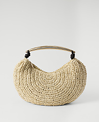 A beige crocheted crescent-shaped handbag with a gold curved handle rests against a plain white background. carousel Product Image 1