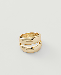 Two stacked gold rings with "ANN TAYLOR" inscribed on the inner surface rest on a plain white background. carousel Product Image 1