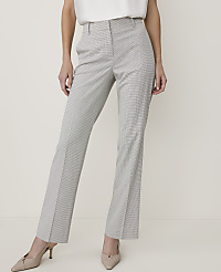 A woman in pinstripe pants and heels stands against a plain, light-colored background. carousel Product Image 2