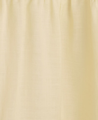 A pale yellow curtain with soft folds hangs in front of a subtly textured, lighter background. carousel Product Image 5