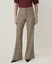 A person stands in flared plaid trousers and a maroon blouse against a plain, light-colored background. carousel Product Image 2