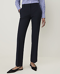 A person in a blue striped shirt and navy pants stands on a light-colored floor against a plain white background. carousel Product Image 2
