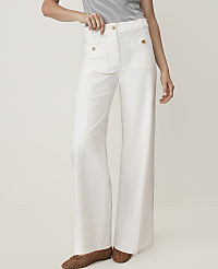 A person wearing white wide-leg pants and brown flats stands against a plain white background. carousel Product Image 2