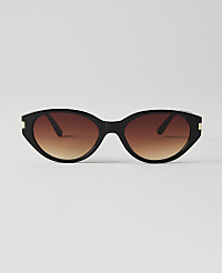 Black cat-eye sunglasses with gradient brown lenses are centered against a plain white background. carousel Product Image 1