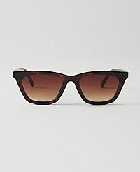Tortoiseshell sunglasses with gradient brown lenses are centered against a plain white background. carousel Product Image 1