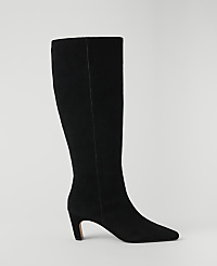 A black suede knee-high boot with a pointed toe and a low heel stands against a plain white background. carousel Product Image 1