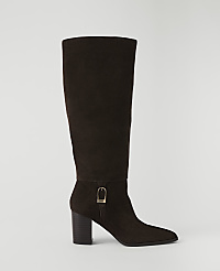 A dark brown suede knee-high boot with a buckle detail stands on a plain white background. carousel Product Image 1
