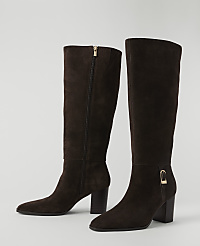 A pair of dark brown suede knee-high boots with gold accents stand on a plain white background. carousel Product Image 2