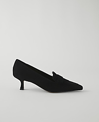 A black suede loafer with a pointed toe and a kitten heel rests on a plain white background. carousel Product Image 1