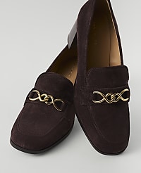 A pair of dark brown suede loafers with gold chain accents are displayed against a plain, light gray background. carousel Product Image 2