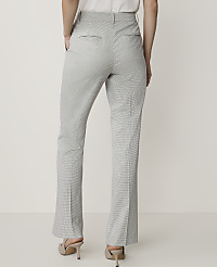 A person wearing checkered pants and heels stands against a plain white background. carousel Product Image 3