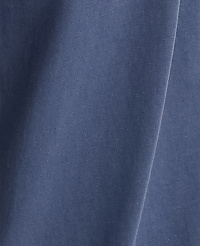 A close-up view of a wrinkled, blue fabric fills the frame, with soft shadows and highlights creating depth. carousel Product Image 4