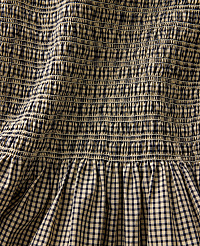 A close-up view of smocked fabric in the foreground transitions to a gathered gingham pattern in the background. carousel Product Image 6
