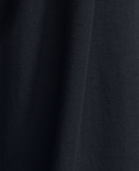 Dark blue fabric with subtle texture fills the frame, with soft folds creating shadows and highlights. carousel Product Image 3