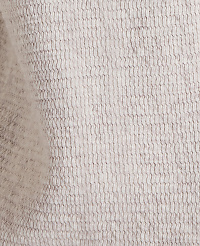 A close-up view of a textured, light gray fabric fills the frame, with subtle variations in shade creating a soft, mottled background. carousel Product Image 5