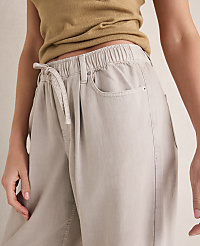 A person in light-colored pants with a drawstring waist stands against a neutral background. carousel Product Image 2