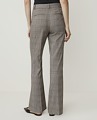 A person wearing plaid flare pants stands against a plain white background. carousel Product Image 3