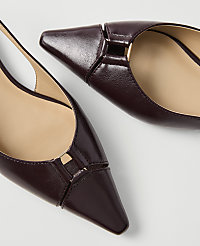 A pair of deep burgundy leather slingback heels with gold accents are displayed against a plain white background. carousel Product Image 2