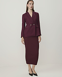 A woman in a burgundy suit stands against a plain, light-colored background. carousel Product Image 1