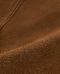 A person wears a brown suede skirt with a black belt featuring a gold buckle, against a plain white background. carousel Product Image 5