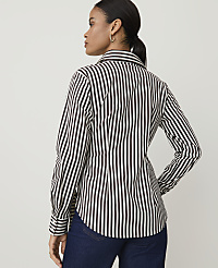 A woman in a black and white striped shirt stands against a plain white background. carousel Product Image 2
