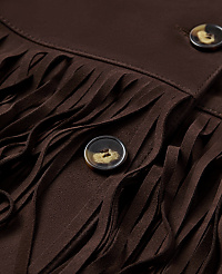 Brown fabric with fringe and buttons in the foreground is set against a blurred background. carousel Product Image 4