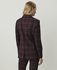 A woman in a burgundy plaid suit stands against a plain, light gray background. carousel Product Image 2