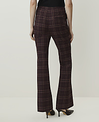 A person wearing flared plaid pants and heels stands against a plain white background. carousel Product Image 3