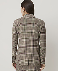 A woman in a brown plaid blazer and skirt stands against a plain, light gray background. carousel Product Image 2