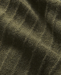 A close-up of textured olive-green fabric with diagonal ribbing fills the frame, with subtle shadows and highlights creating depth. carousel Product Image 2
