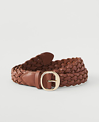 A braided brown leather belt with a gold buckle lies on a plain white background. carousel Product Image 1