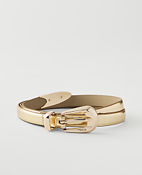 A shiny gold belt with a matching buckle lies on a plain white background. carousel Product Image 1