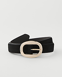 A black suede belt with a large, oval, rose gold buckle rests on a plain white background. carousel Product Image 1