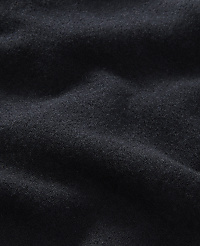 A dark, textured fabric with soft folds fills the frame, creating a sense of depth and shadow. carousel Product Image 2