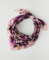 A floral patterned silk scarf with pink and purple flowers is tied in a knot against a plain white background. carousel Product Image 1