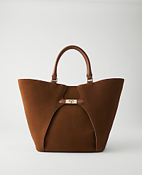 A rich brown suede tote bag with leather handles and a gold clasp sits against a plain white background. carousel Product Image 1