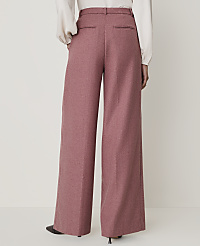 A person wearing wide-leg pink trousers stands against a plain white background. carousel Product Image 3